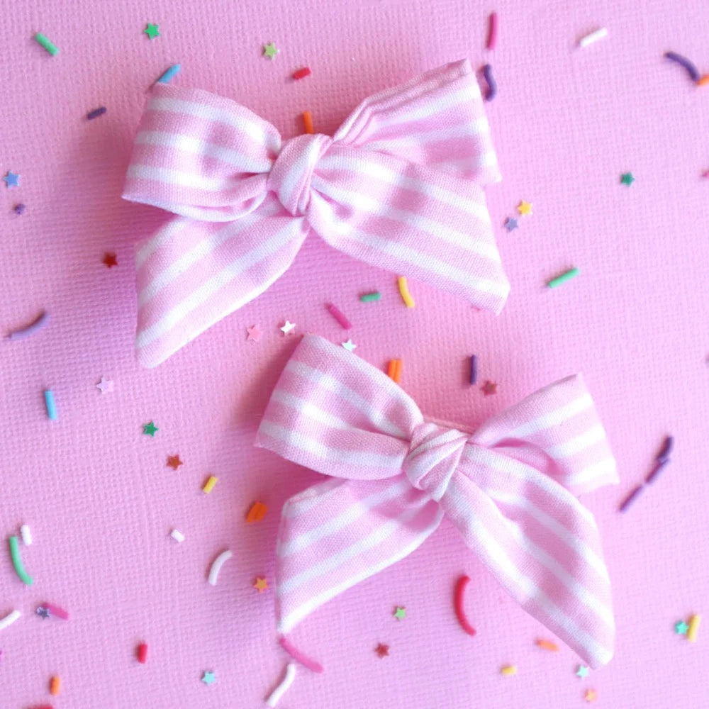 LAUREN HINKLEY PINK STRIPPED BOW CLIPS